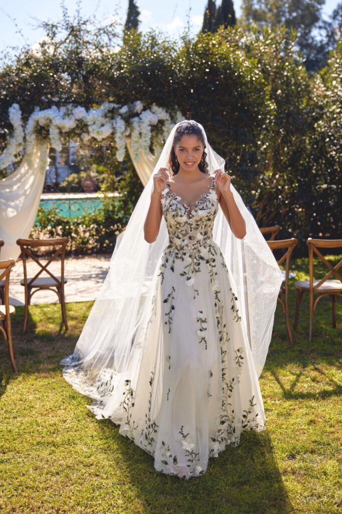 66437-Lillian West-Pure Bridal. Tulle A-Line Gown with Illusion Sabrina Neckline and Green Leaf Appliqu&eacute;s. Edmonton wedding shop, Edmonton bridal shop, Edmonton wedding dress.