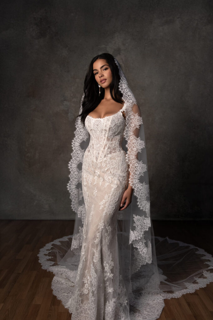 Essense of Australia Style D4437 lace corset wedding dress at Pure Bridal in Edmonton. Matching veil can be ordered separately.